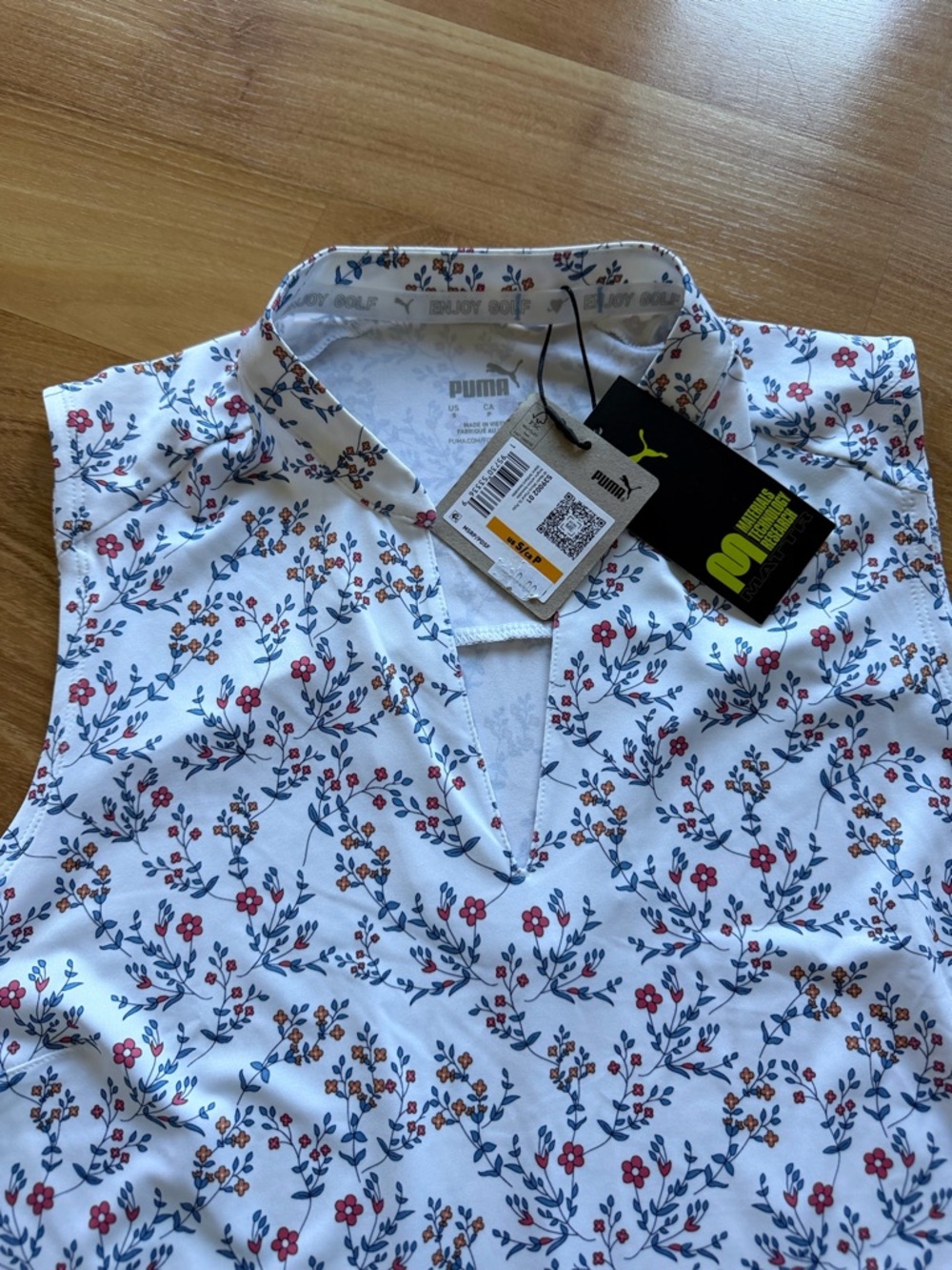 Puma NWT “Micro Floral” women’s sleeveless golf polo size small so soft
